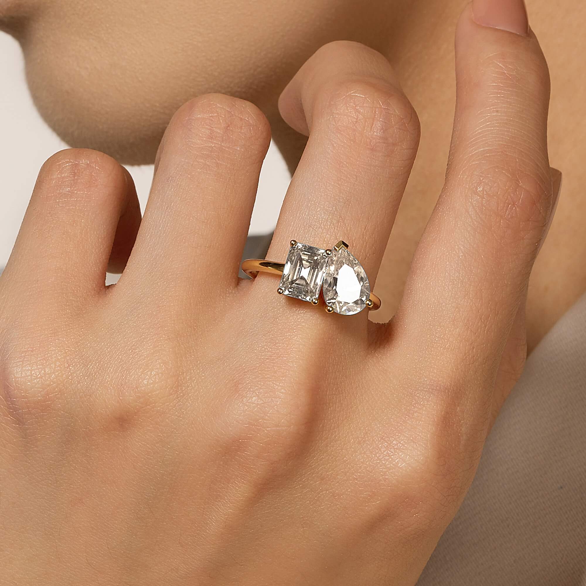 Emerald and Pear Moissanite Toi et Moi Ring